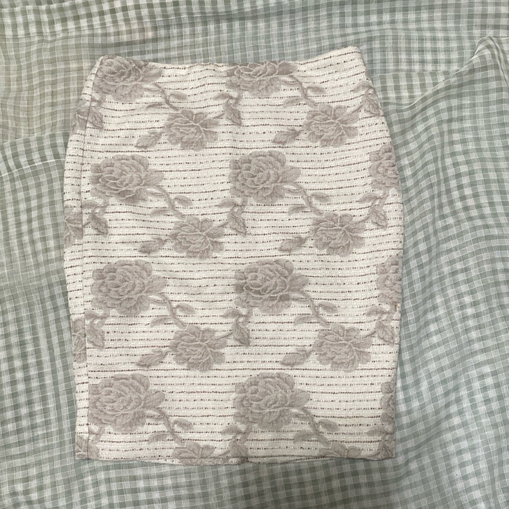 Ann Taylor light and dark skirt with flower patterns. Still w/ tags. Never worn
